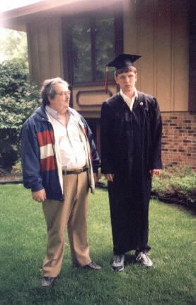 Mike in robes with uncle